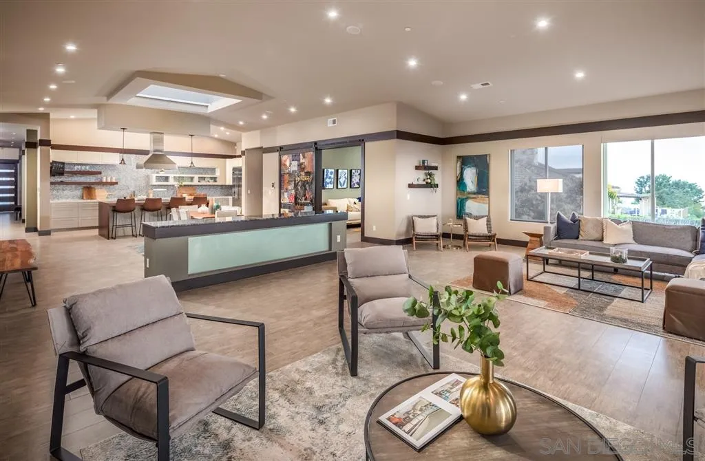 5630 Soledad Road La Jolla, CA 92037 - Photo 7 of 25 a living room with furniture and a large window