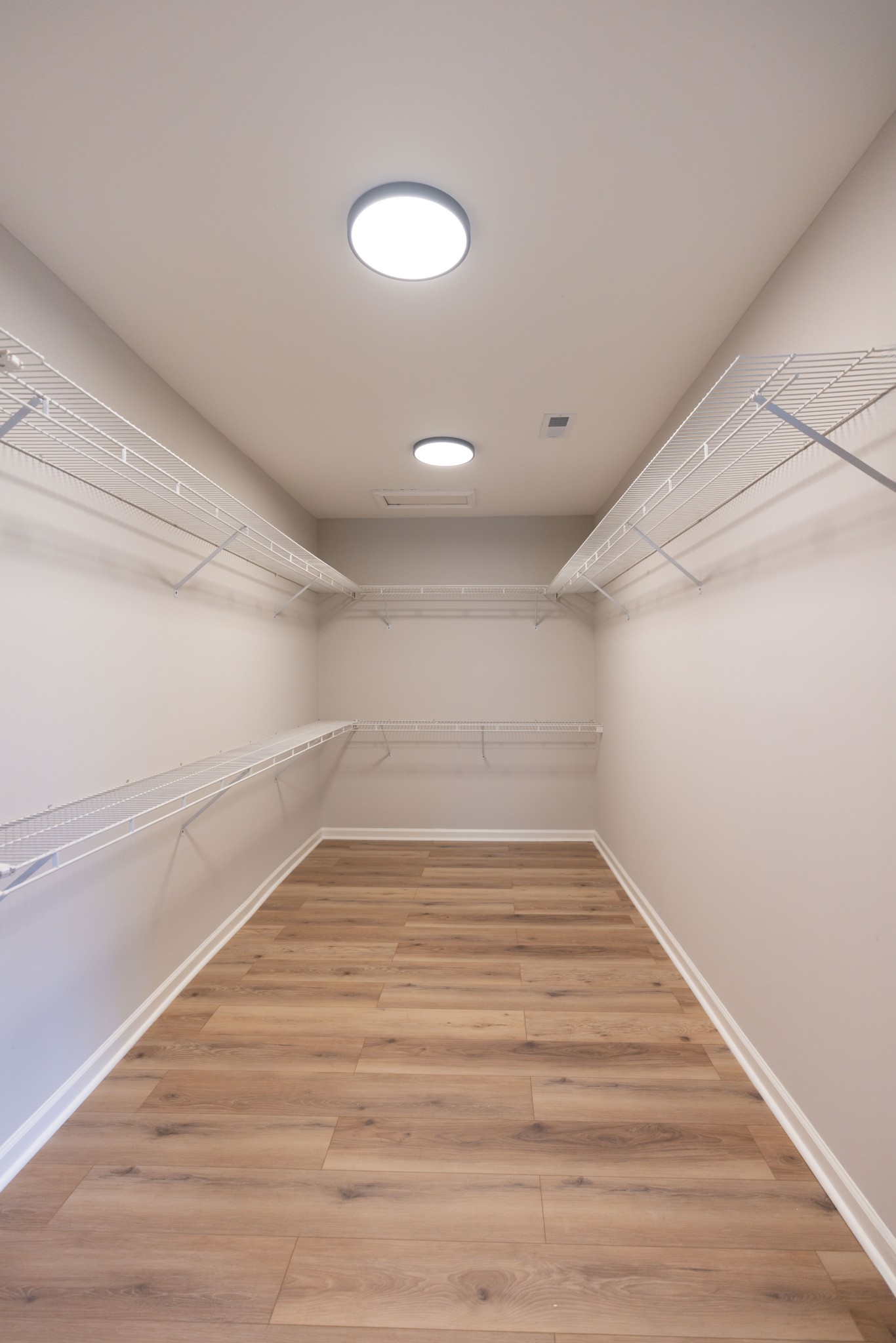 130 Kinneys School Road Springfield, TN 37172 - Photo 14 of 19 a view of a room with wooden floors and white walls