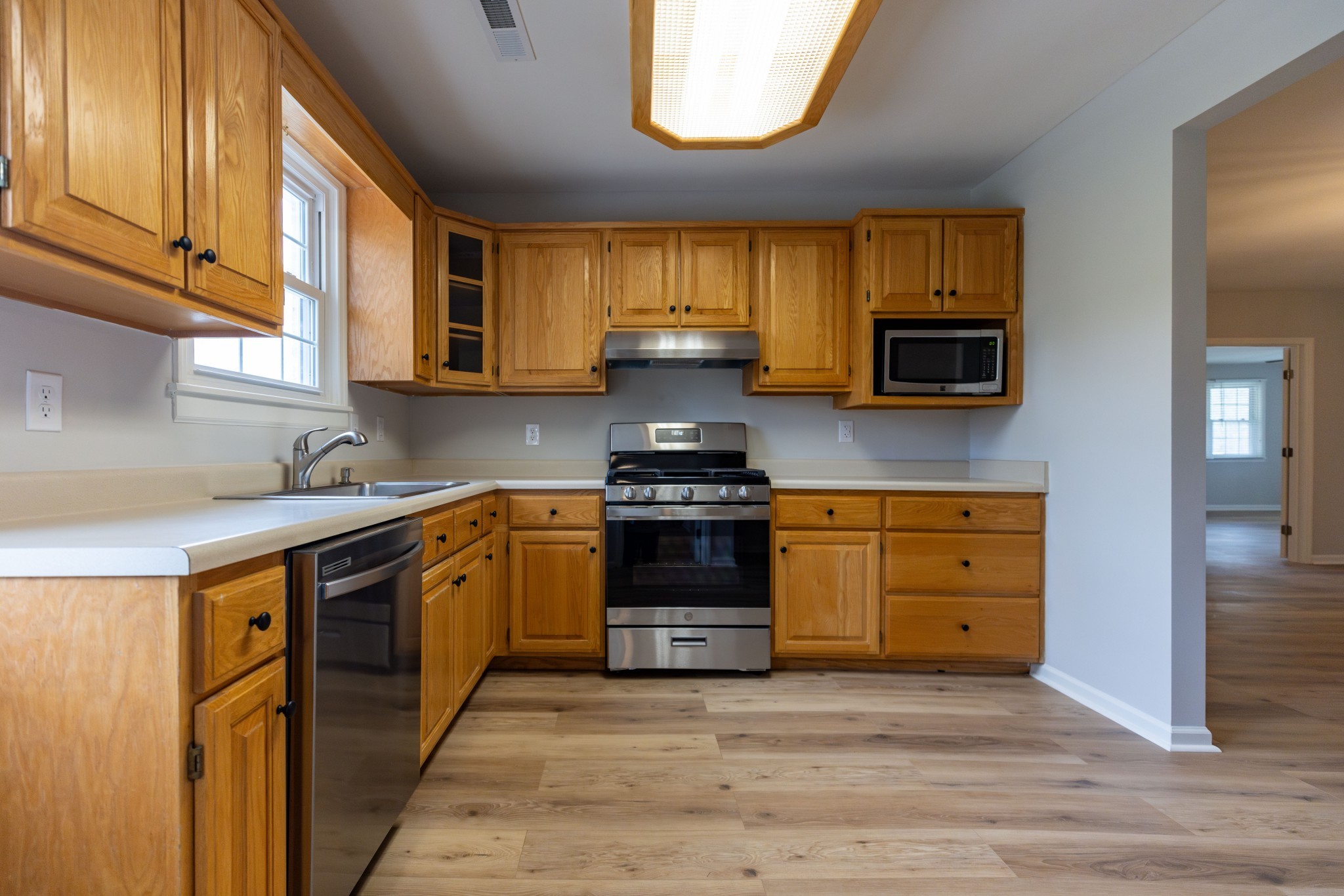 130 Kinneys School Road Springfield, TN 37172 - Photo 7 of 19 a kitchen with a stove and a sink
