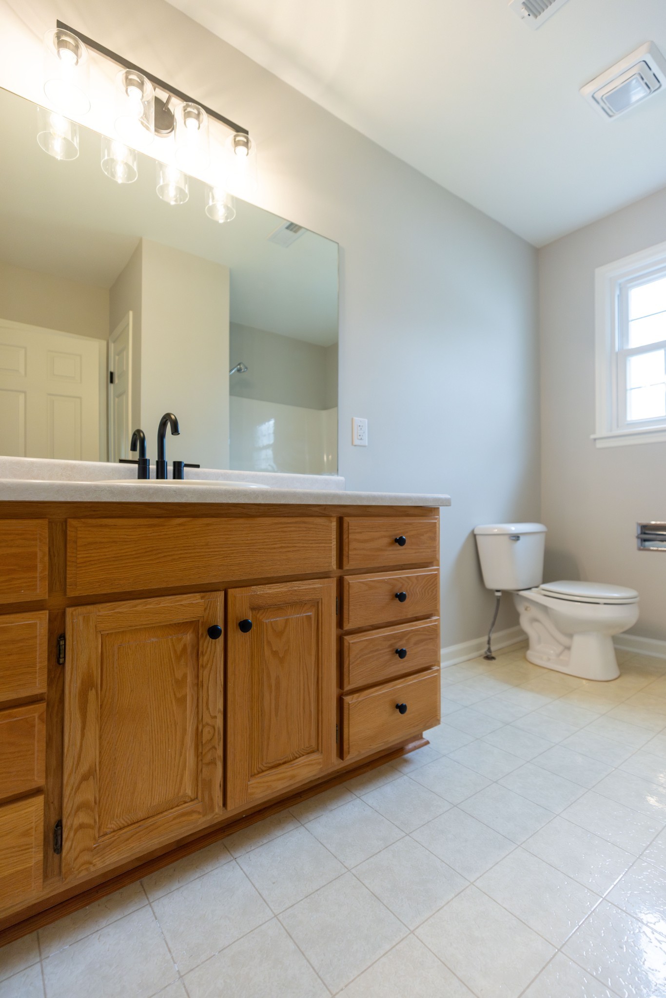 130 Kinneys School Road Springfield, TN 37172 - Photo 8 of 19 a bathroom with a toilet sink and mirror