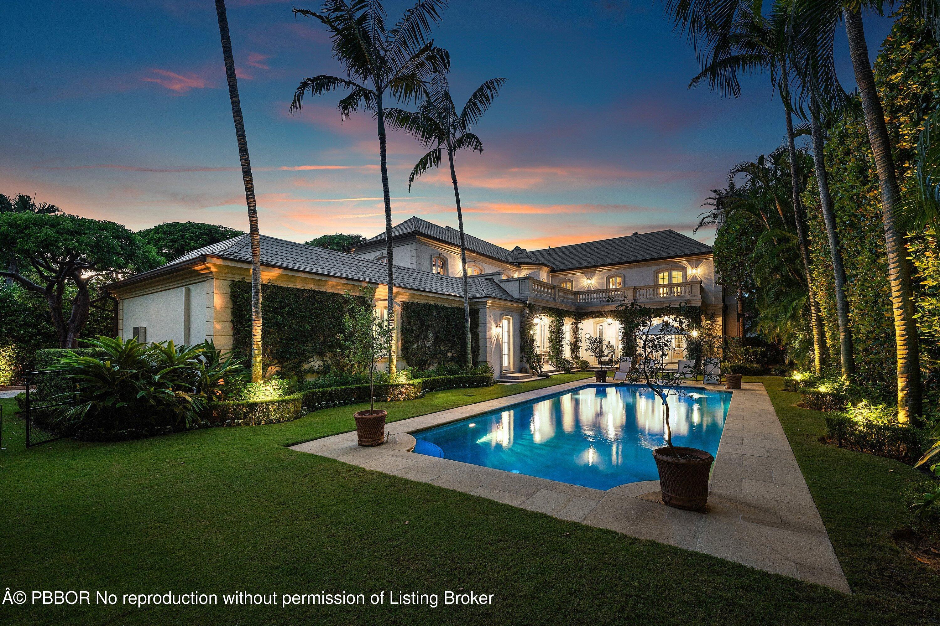 242 Wells Road Palm Beach, FL 33480 - Photo 49 of 54 a front view of a house with garden