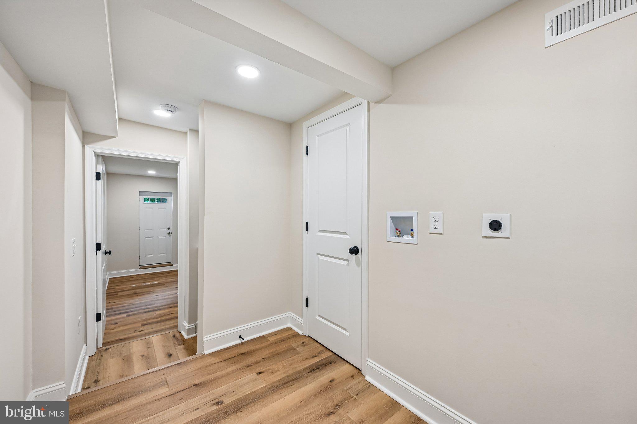 5714 Rusk Avenue Baltimore, MD 21215 - Photo 41 of 51 Inviting hallway with modern finishes.