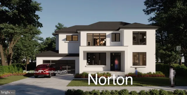 a front view of a house with parking space