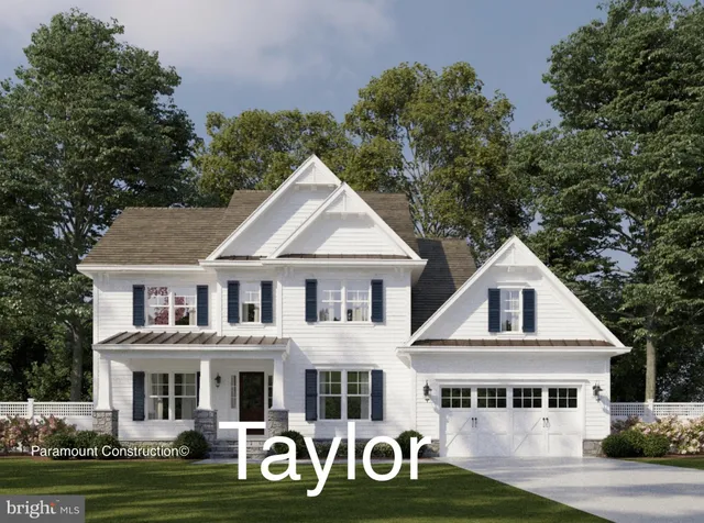 a front view of a house with parking space