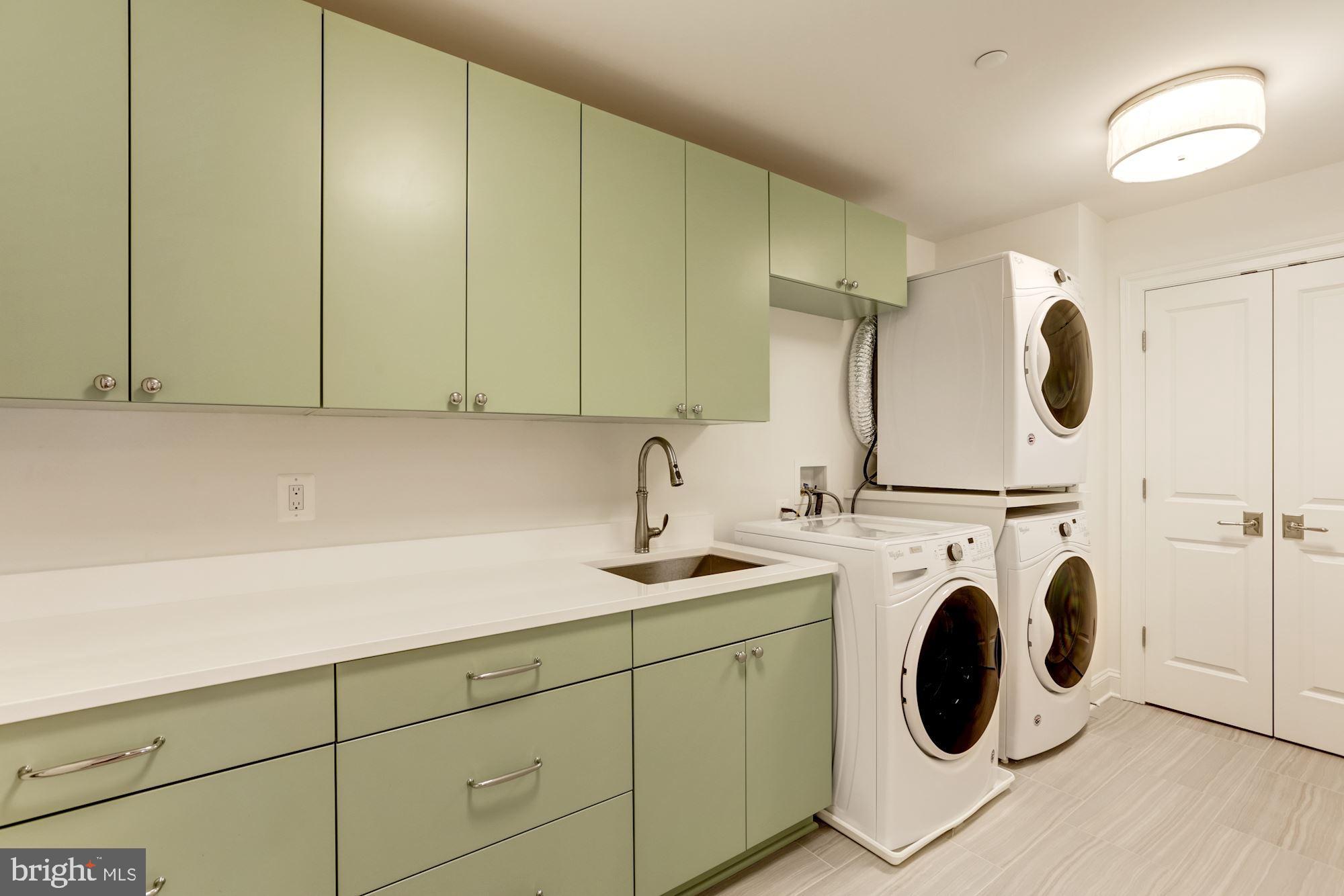 1601 Wrightson Drive McLean, VA 22101 - Photo 48 of 112 a kitchen with a sink and a washer dryer