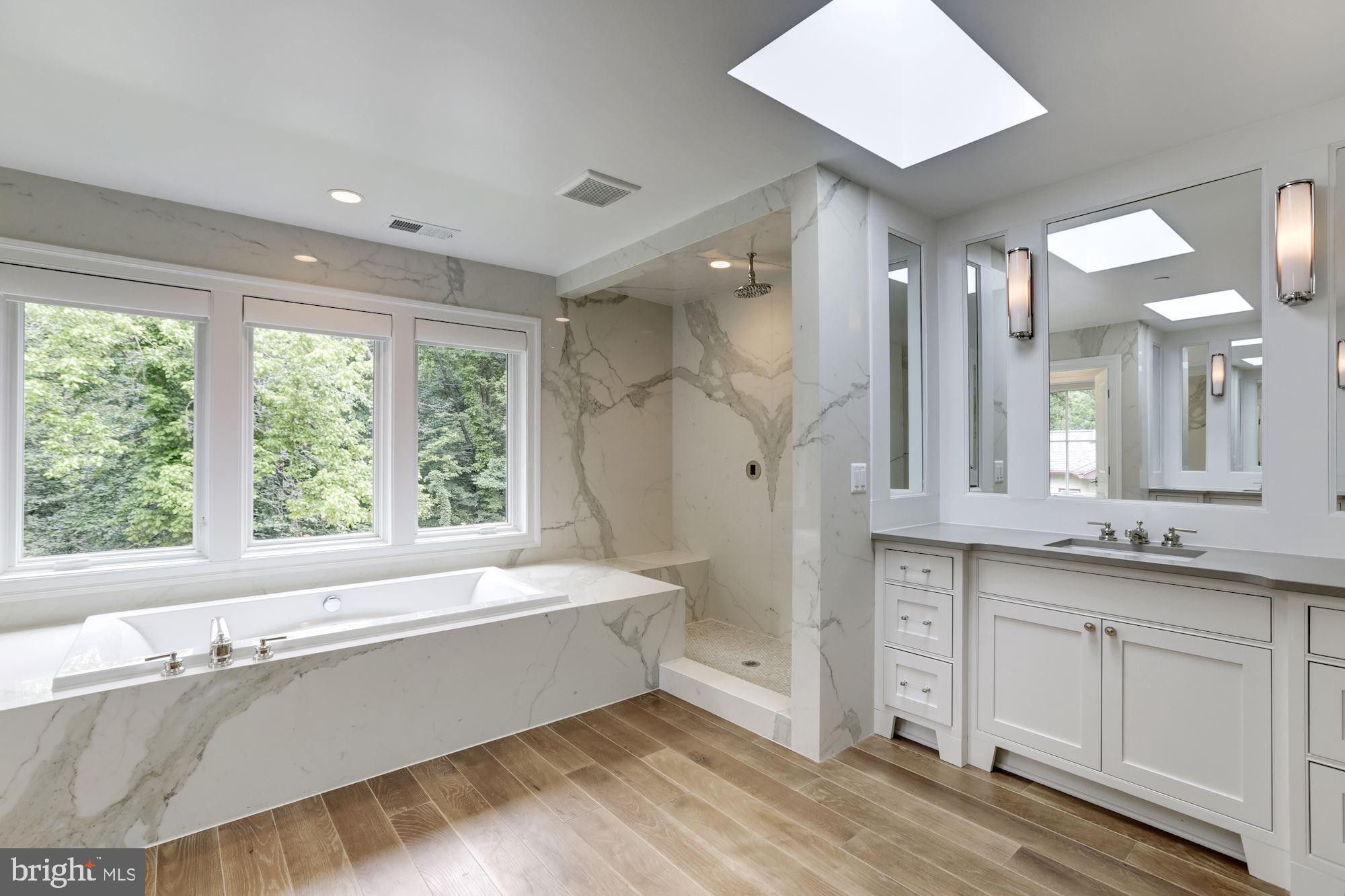 1601 Wrightson Drive McLean, VA 22101 - Photo 51 of 112 a bathroom with a bathtub and a sink