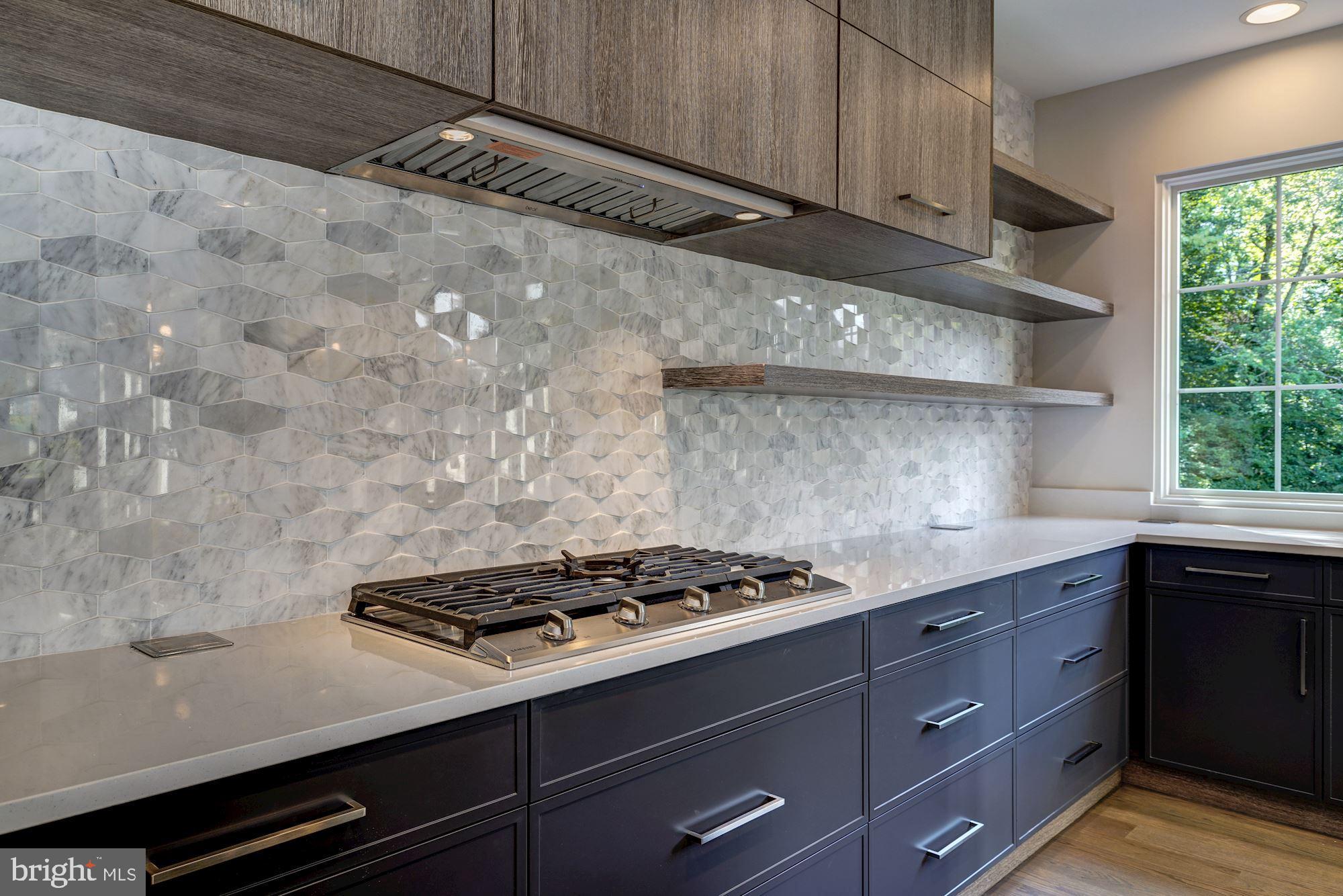 1601 Wrightson Drive McLean, VA 22101 - Photo 61 of 112 a kitchen with granite countertop a stove and a sink