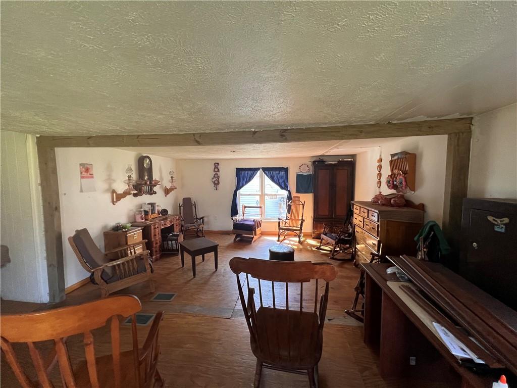 50 Rhine Run Road Russell, PA 16345 - Photo 7 of 20 a living room with furniture a rug and a window