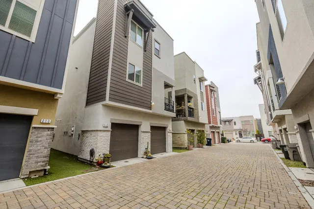 a view of a street with buildings