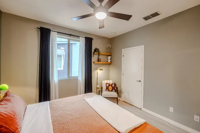a bathroom with a sink double vanity and a mirror