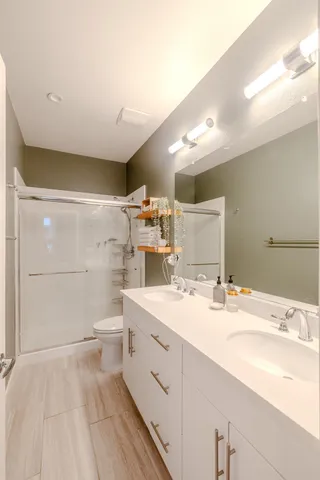 view of a hallway with toys and painted walls