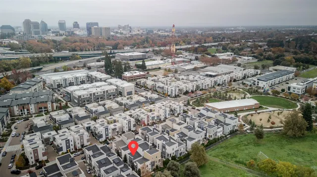 a group of cars parked in front of building