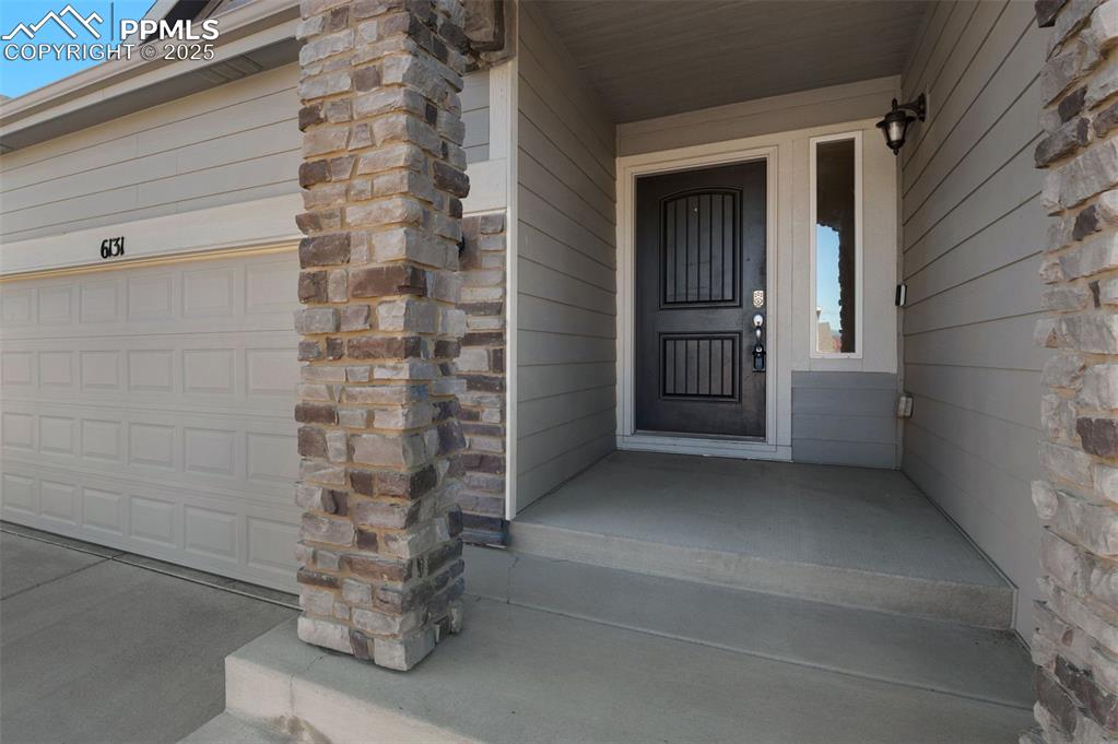 6131 Anders Ridge Lane Colorado Springs, CO 80927 - Photo 2 of 38 View of exterior entry