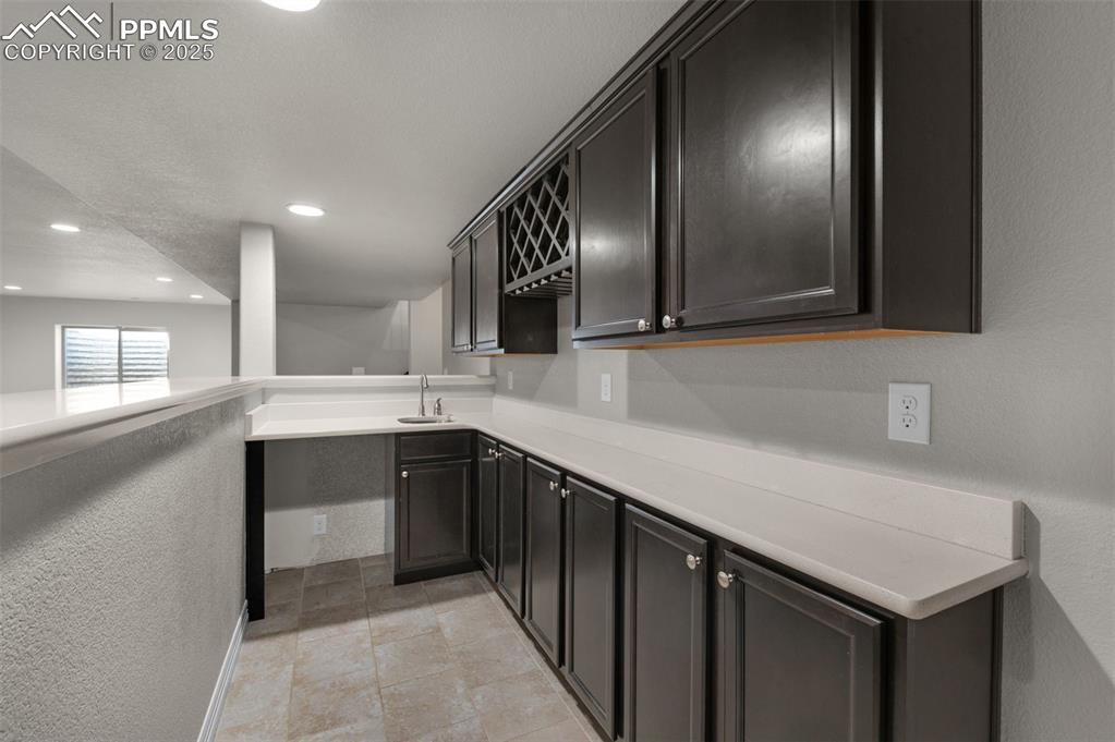 6131 Anders Ridge Lane Colorado Springs, CO 80927 - Photo 27 of 38 Wet bar