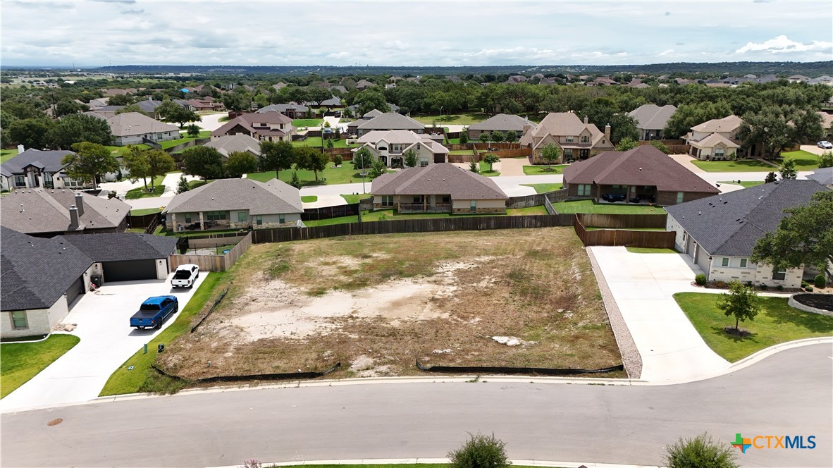 3015 Box Canyon Nolanville, TX 76559 - Photo 2 of 9 an aerial view of a house with a swimming pool yard and outdoor seating