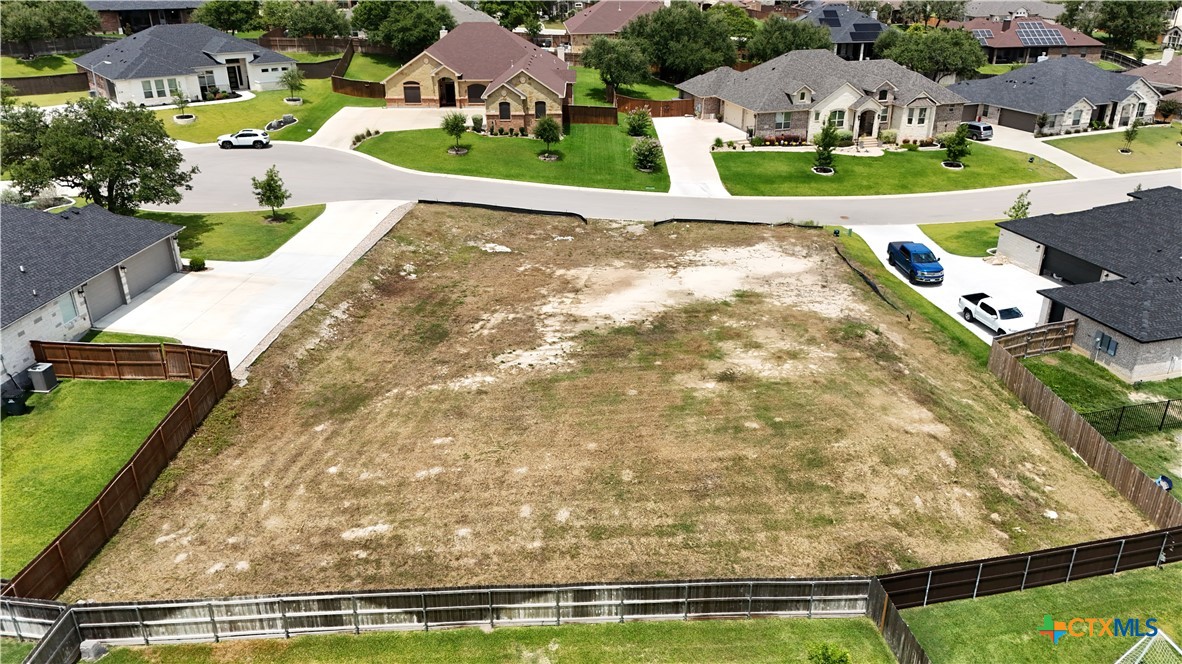 3015 Box Canyon Nolanville, TX 76559 - Photo 4 of 9 an aerial view of a house with a yard basket ball court and outdoor seating
