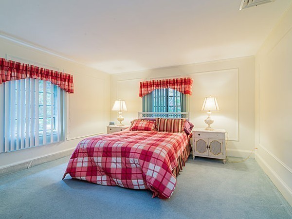143 Upland Road Newton, MA 02468 - Photo 13 of 21 a bedroom with a bed and window