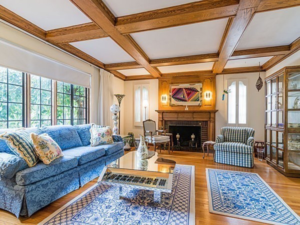 143 Upland Road Newton, MA 02468 - Photo 3 of 21 a living room with furniture and a fireplace