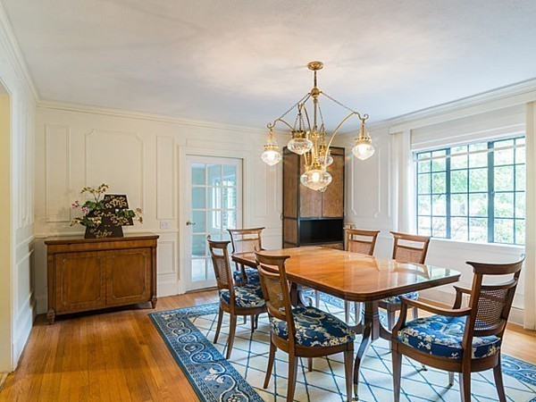 143 Upland Road Newton, MA 02468 - Photo 6 of 21 a view of a dining room with furniture window and wooden floor