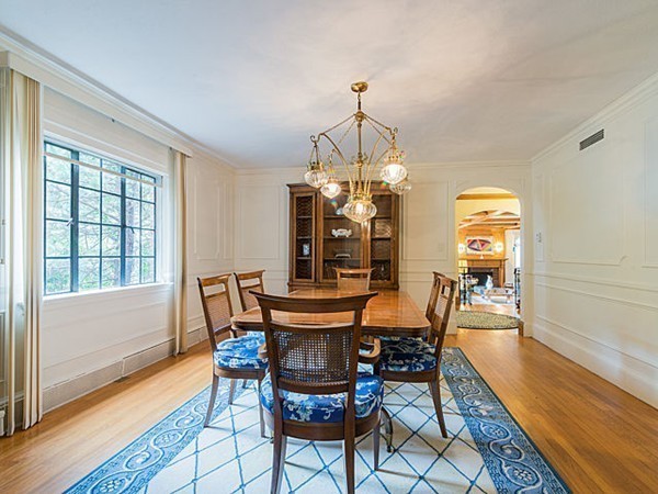 143 Upland Road Newton, MA 02468 - Photo 7 of 21 a view of a dining room with furniture window and wooden floor
