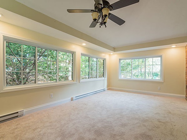 143 Upland Road Newton, MA 02468 - Photo 8 of 21 a view of an empty room with a window
