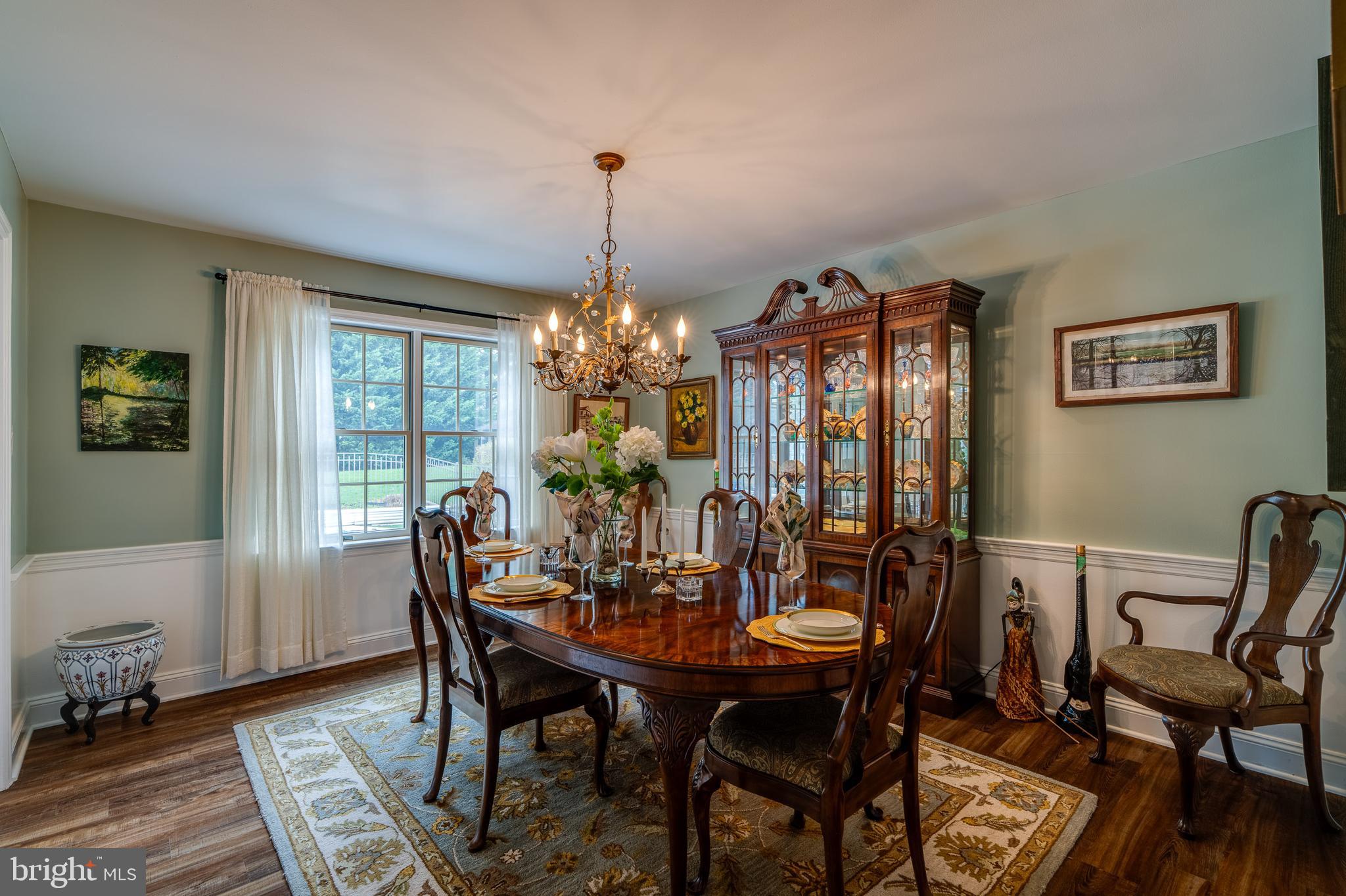 318 Portland Place Lititz, PA 17543 - Photo 20 of 39 a view of a dining room with furniture window and wooden floor