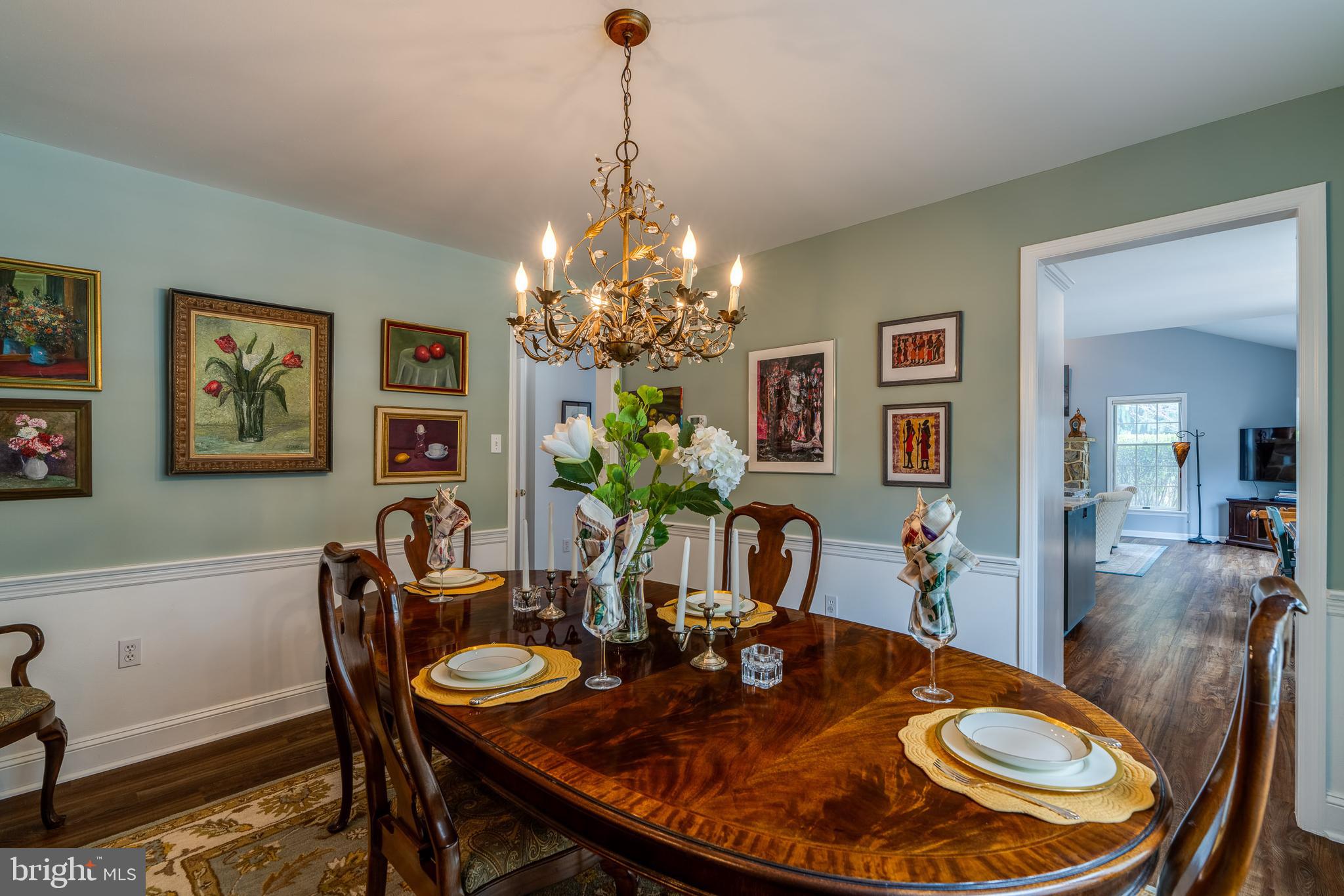 318 Portland Place Lititz, PA 17543 - Photo 21 of 39 a view of a dining room with furniture and chandelier