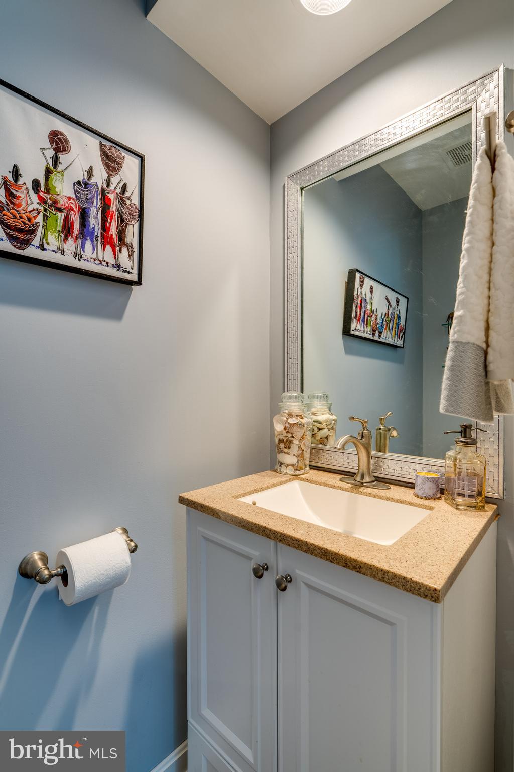 318 Portland Place Lititz, PA 17543 - Photo 24 of 39 a bathroom with a sink mirror and vanity