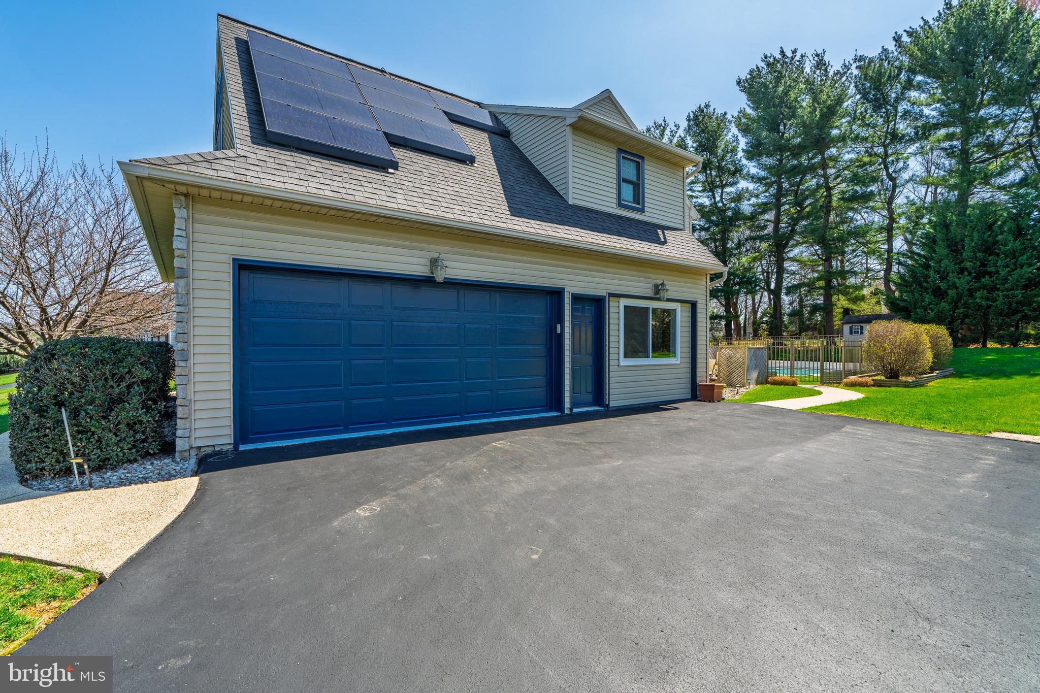 318 Portland Place Lititz, PA 17543 - Photo 3 of 39 a view of the house with backyard and garden