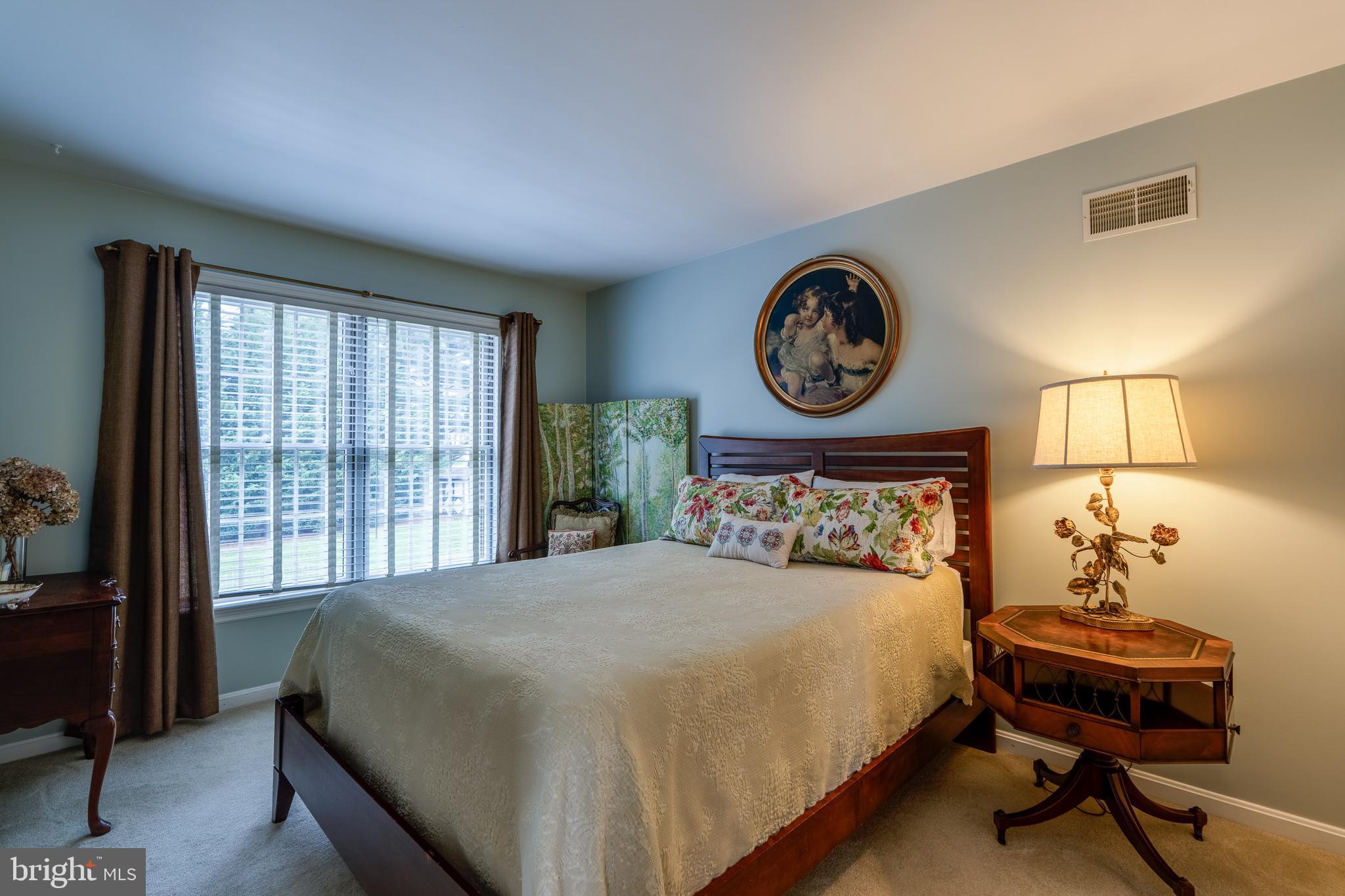 318 Portland Place Lititz, PA 17543 - Photo 33 of 39 a bedroom with a bed and a chair