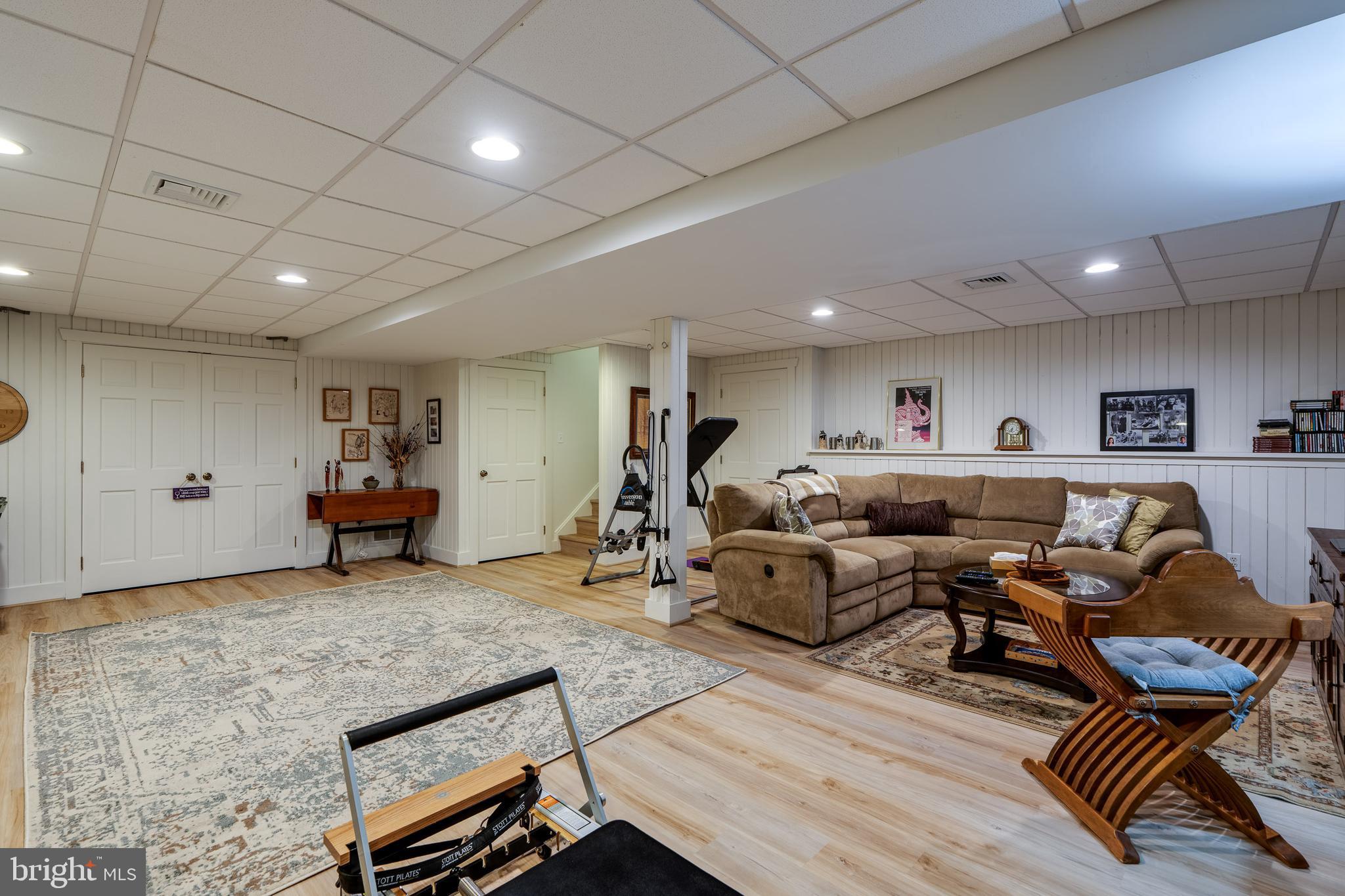 318 Portland Place Lititz, PA 17543 - Photo 35 of 39 a living room with lots of furniture and a wooden floor