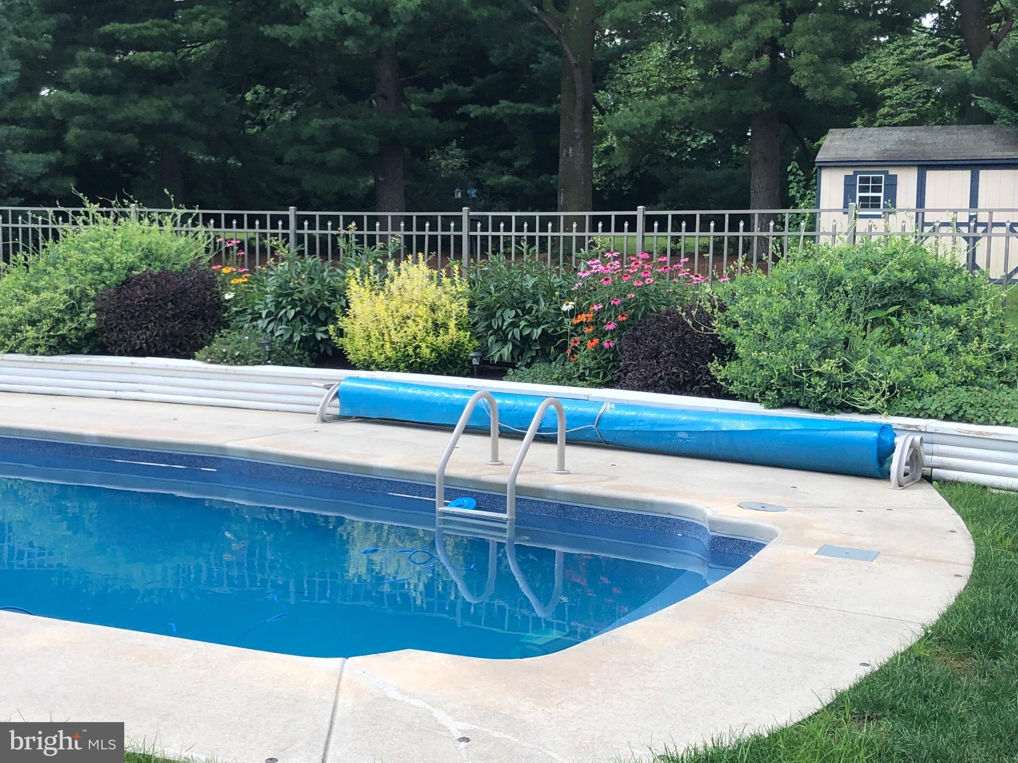 318 Portland Place Lititz, PA 17543 - Photo 8 of 39 a view of a swimming pool with a patio