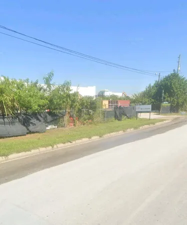 a view of a house with a street