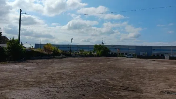 a view of a house with a street