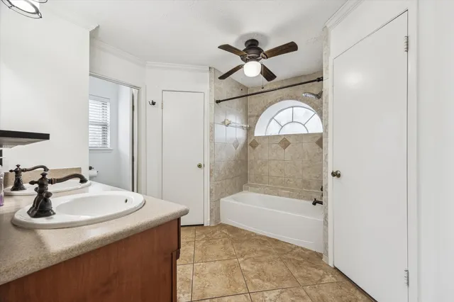 a bathroom with a sink a mirror and a bathtub