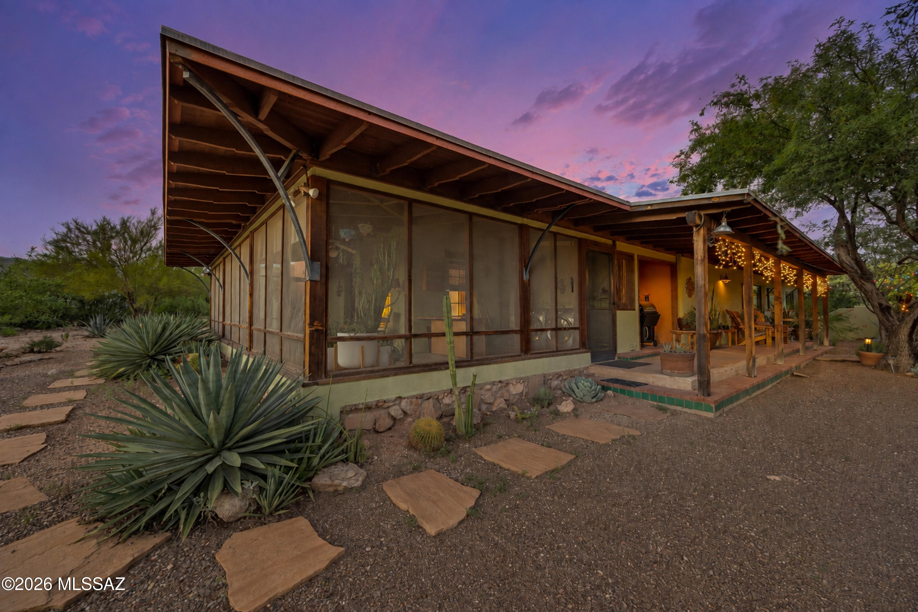 13013 East Redington Road Tucson, AZ 85749 - Photo 29 of 51 West screened-in porch and south patio area.
