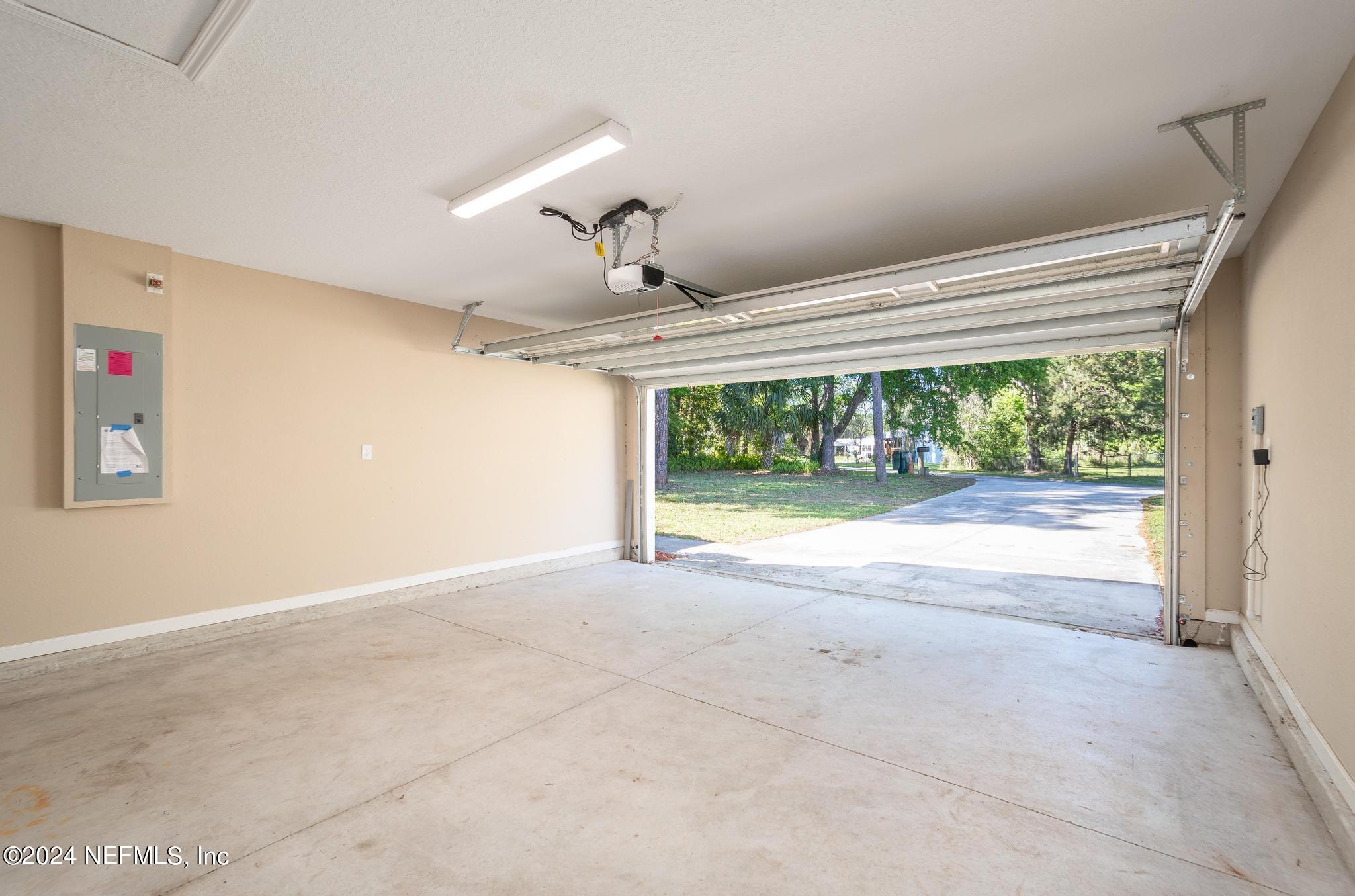 9890 Fraser Road Jacksonville, FL 32246 - Photo 21 of 23 a view of large room with front door