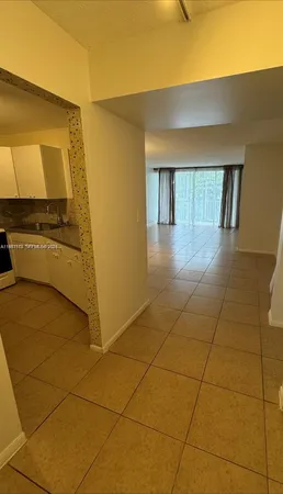 a view of a kitchen with a sink
