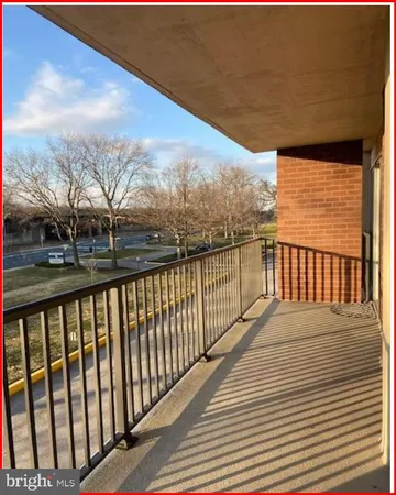 a kitchen with stainless steel appliances a stove a microwave and a refrigerator