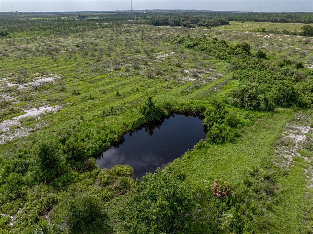 0 Cr 630 Frostproof Frostproof, FL 33843 - Photo 9 of 11 a view of a lake with beach