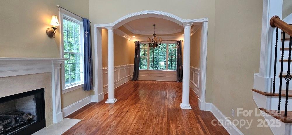 6926 Linkside Court Charlotte, NC 28277 - Photo 12 of 24 a view of livingroom with hardwood floor and a fireplace