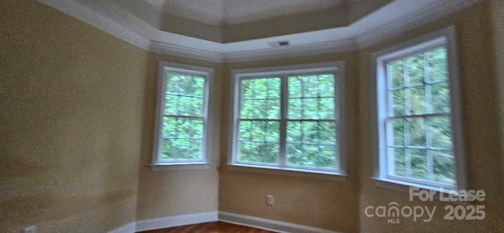 6926 Linkside Court Charlotte, NC 28277 - Photo 21 of 24 a view of an empty room with a window