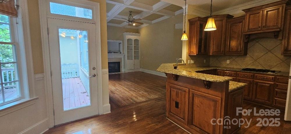 6926 Linkside Court Charlotte, NC 28277 - Photo 3 of 24 a kitchen with stainless steel appliances granite countertop a stove and a refrigerator