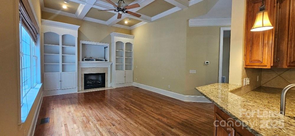 6926 Linkside Court Charlotte, NC 28277 - Photo 7 of 24 a view of a livingroom with a fireplace