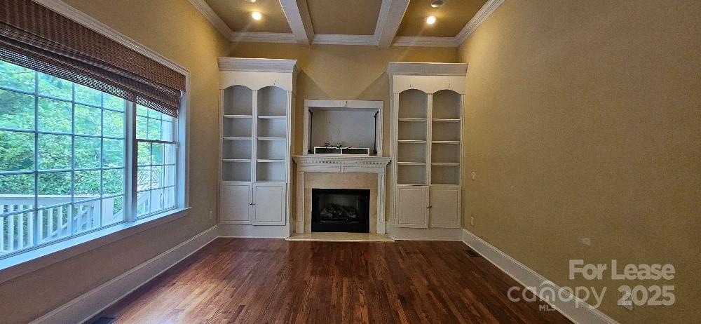 6926 Linkside Court Charlotte, NC 28277 - Photo 8 of 24 a view of livingroom with hardwood floor and fireplace