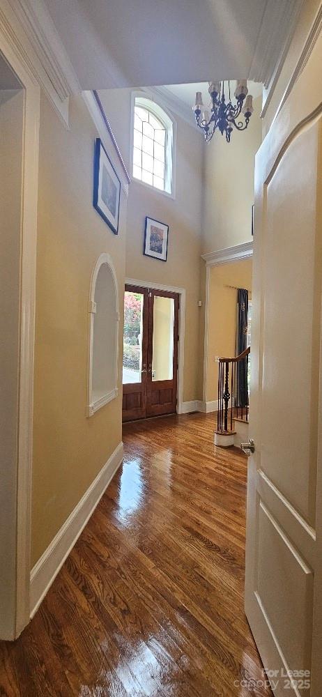 6926 Linkside Court Charlotte, NC 28277 - Photo 9 of 24 a view of an entryway with wooden floor