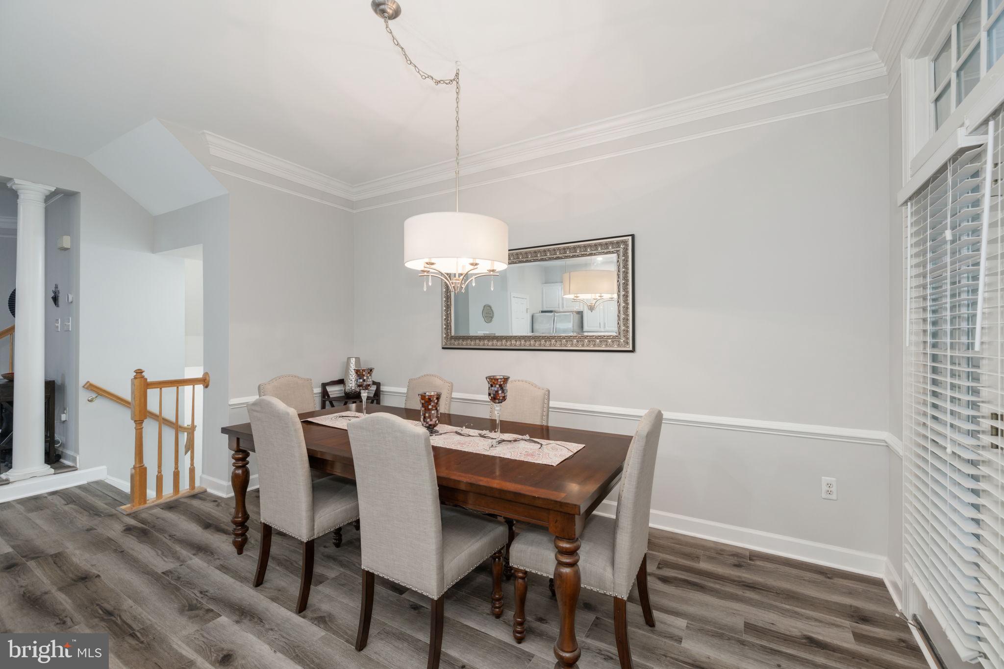 6337 Simmer Circle Springfield, VA 22150 - Photo 18 of 50 a view of a dining room with a table and chairs