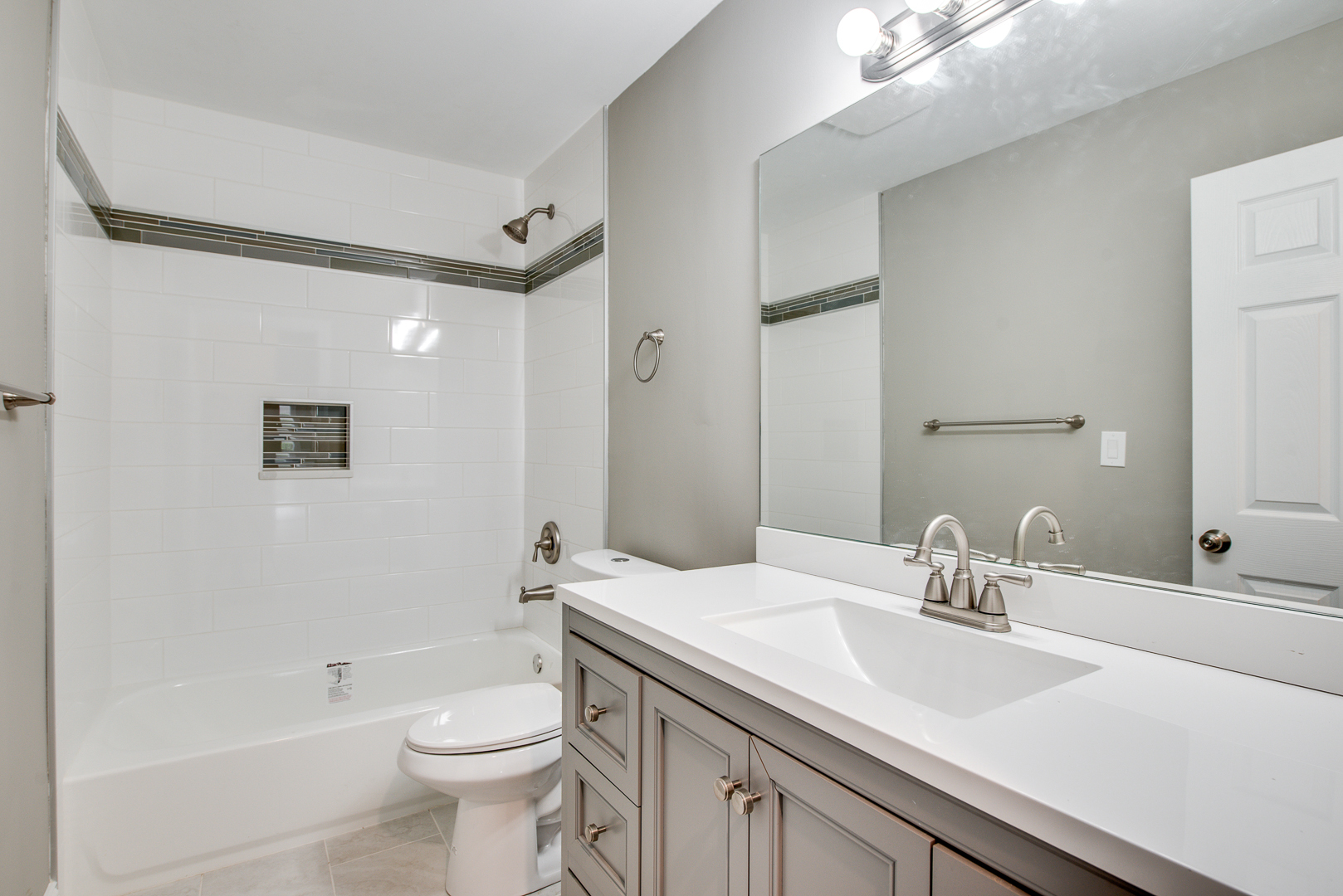 106 Foxcroft Road Naperville, IL 60565 - Photo 17 of 21 a bathroom with a sink a toilet and shower