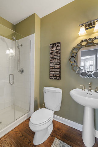 3111 Turnberry Road St. Charles, IL 60174 - Photo 13 of 34 a bathroom with a toilet sink and shower