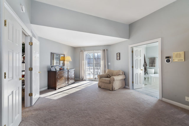 3111 Turnberry Road St. Charles, IL 60174 - Photo 17 of 34 a living room with furniture and a large window